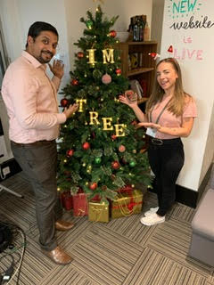 Charlie and Anoop are decorating our Christmas tree